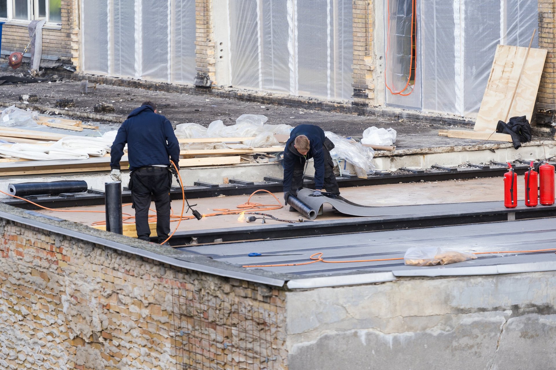Professional flat roof repair installation