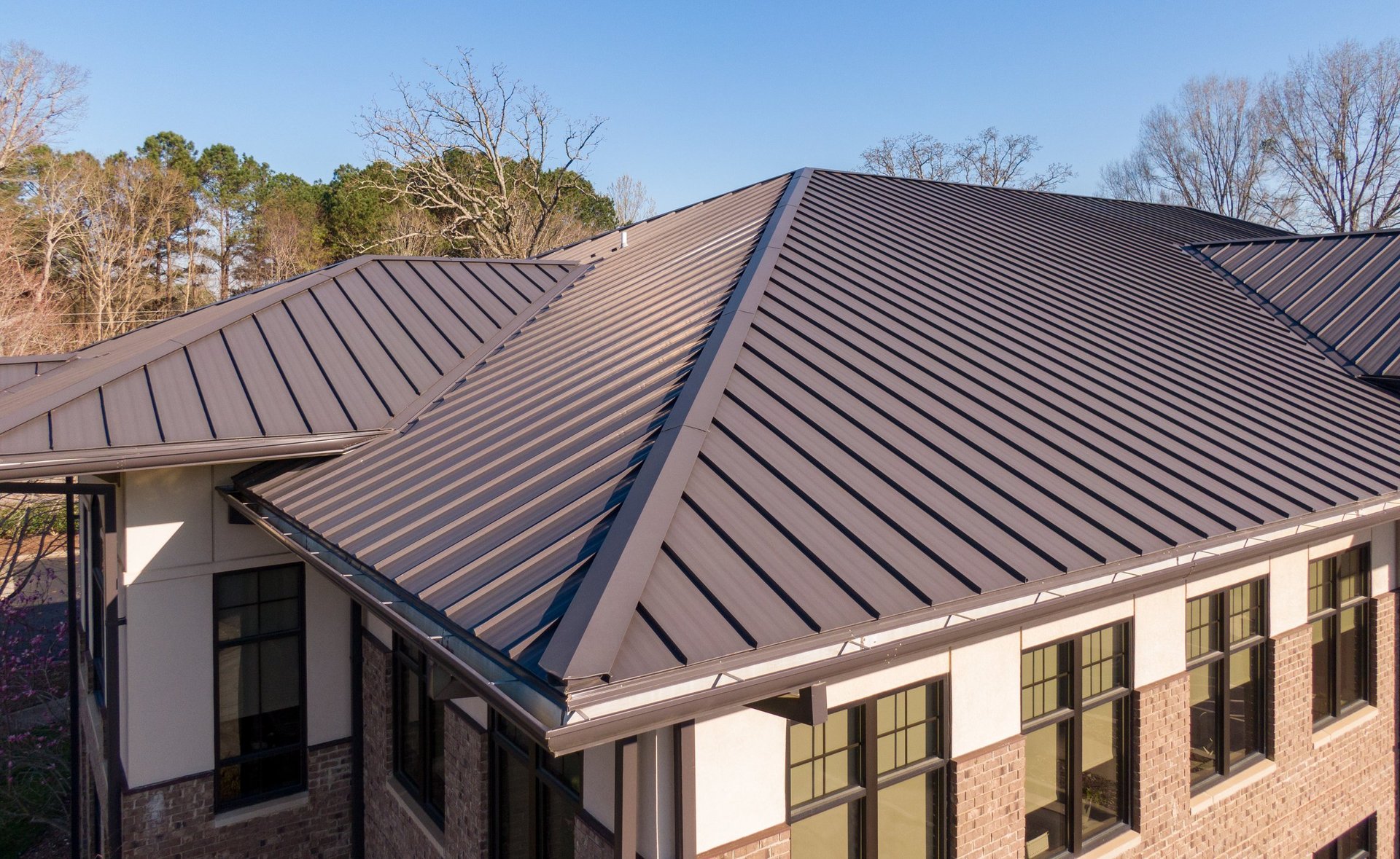 Modern metal roof installation on residential home